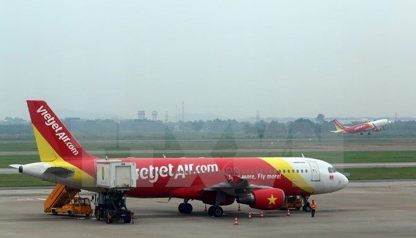 Tàu bay của VietJet Air đi từ sân bay quốc tế Nội Bài (Hà Nội). (Ảnh: Huy Hùng/TTXVN)